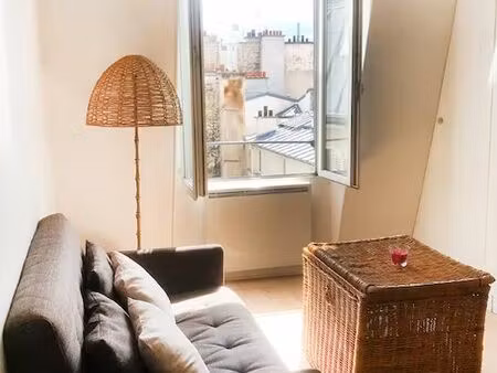 studio en duplex avec vue sur les toits de paris au coeur des batignolles