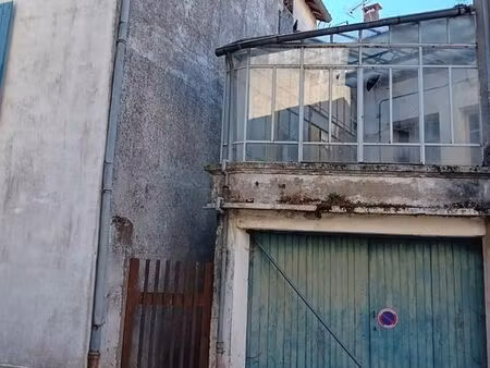 studio avec véranda et grand garage