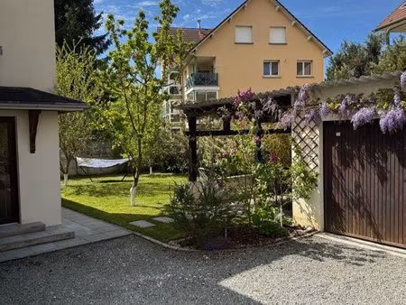 appartement 106 m2 - double garage  terrasse couverte et jardin privé