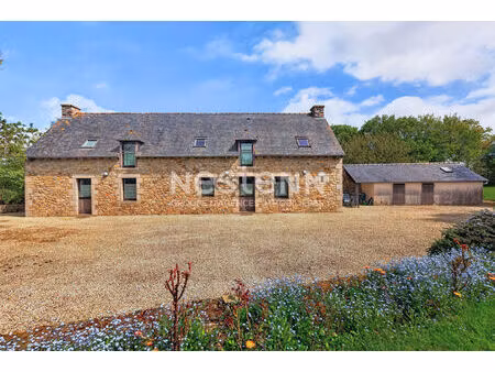 vente d'une maison en pierres avec deux logements  1 hectare de terrain avec un étang en c