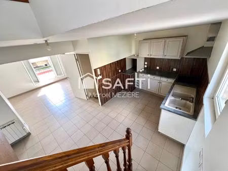 maison de ville (2 beaux appartements;1 loué); terrasse.