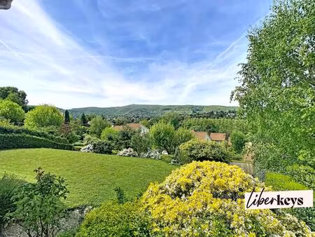 fontaines saint-martin : maison 185m² vue dégagée  5 chambres  terrain 890m²  2 box  cave 