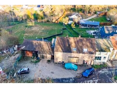 immeuble mixte avec un terrain constructible