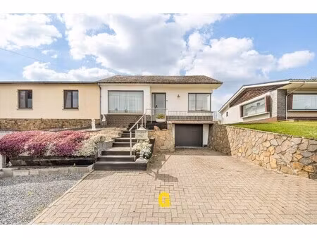 te renoveren doch netjes verzorgde bungalow woning met tuin en garage op 5a 33ca in een aa