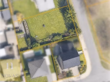 aan het centrum  bouwgrond van 6are09ca  18m breed  ca 35m diep