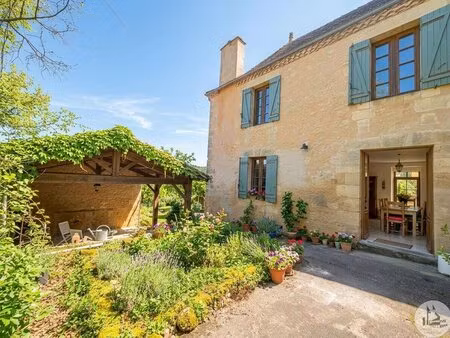 deux maisons en pierre avec jardin de curé