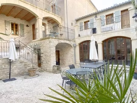 spacieuse maison de village en pierre dans village recherché entre gard et ardèche.