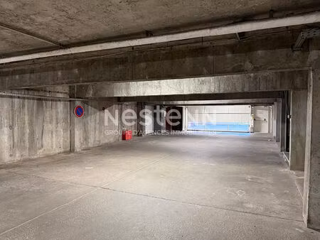 garage box en sous sol avec portes motorisées - 69500 bron