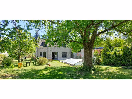 ensemble immobilier à lardy bourg comprenant une maison familiale en pierres de 130 m2  un