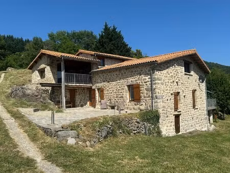 proximité le cheylard  charmante propriété en pierre sur 19572 m2 de terrain.