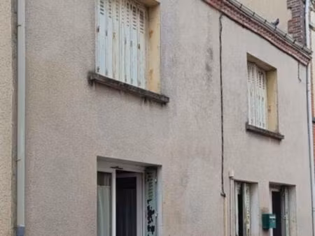 maison comprenant deux appartements centre ville