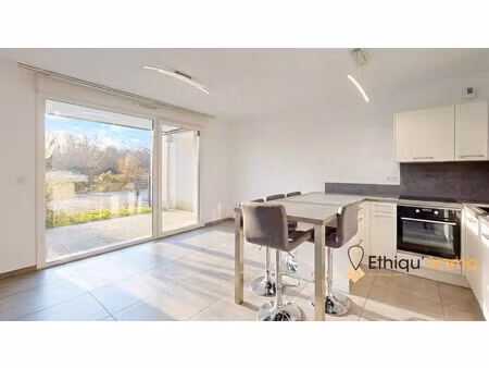 2 pièces - rez-de-jardin - garage - cave