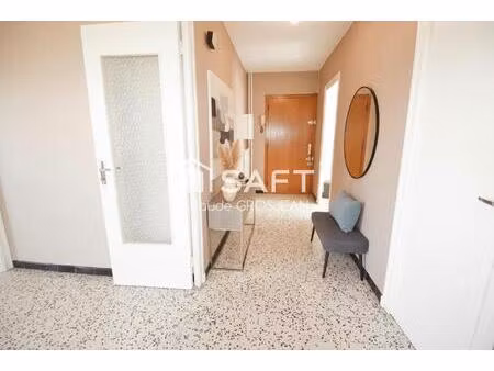 appartement 4 pièces de 91m² avec balcon  parking et cave.