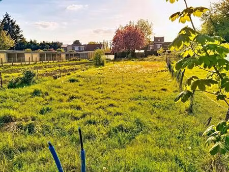 terrain a batir partiellement viabilise  sur la commune de la bassee.proche de toutes comm