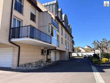 t2 dans une résidence calme avec parking et garage