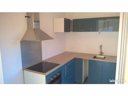 appartement t3 de 64.52 m² + 2 garages