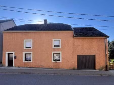 maison 3 facades avec jardin et garage – a renover.
