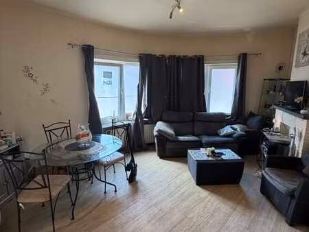 appartement rez-de-chaussée 56 m² - 1 chambre - cour - caves