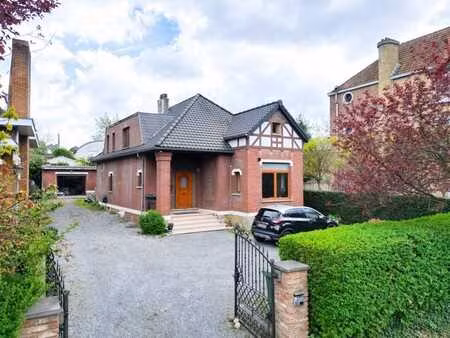 maison 4 façades avec bel extérieur exposé sud-est