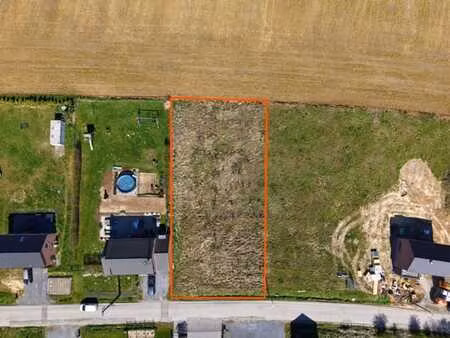 terrain à bâtir de ±1233m² dans le village de marchin