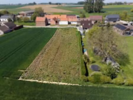magnifique terrain de 14a 41ca dans le beau village de baugn