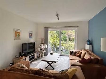 appartement de +/- 80m² au 1er étage avec ascenseur et balco