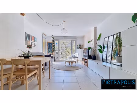 gratte ciel : t3 lumineux dans une résidence verte - garage pos