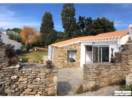 ker bossy  charmante maison  au caime sur une belle parcelle arborée.