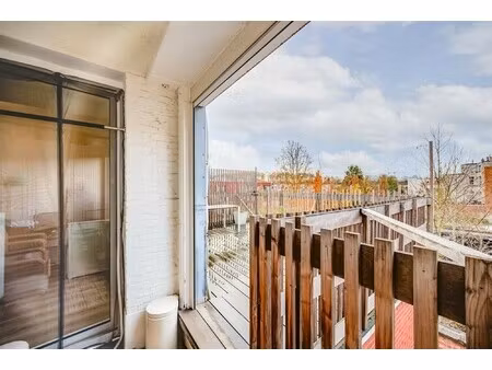 lichtrijk 2-slaapkamerappartement met vergund dakterras in mortsel