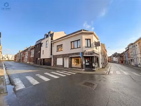 opbrengsteigendom met handelspand en appartement