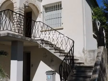 maison 6 pièces avec grand garage et potentiel d'aménagement