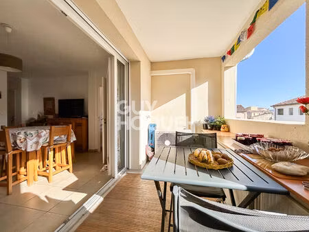appartement avec ascenseur  terrasse et parking centre ville de l'isle sur la sorgue