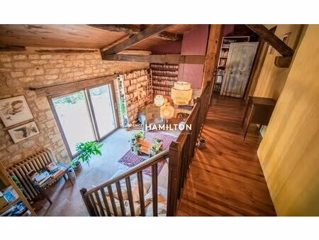 pierre  volumes et nature : une ferme de caractere restauree