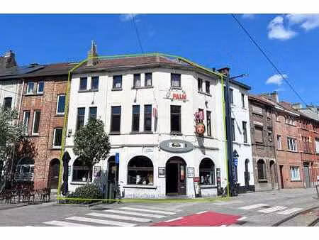 gunstig gelegen handelswoning te koop op de voskenslaan!