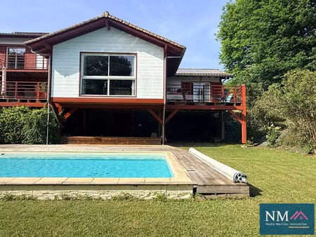 maison ossature bois de 140 m² avec piscine  terrasse sud et panneaux solaires  au calme  