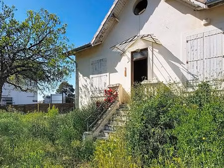 maison de 87 m² sur 448 m² de terrain  grand garage  activité commerciale