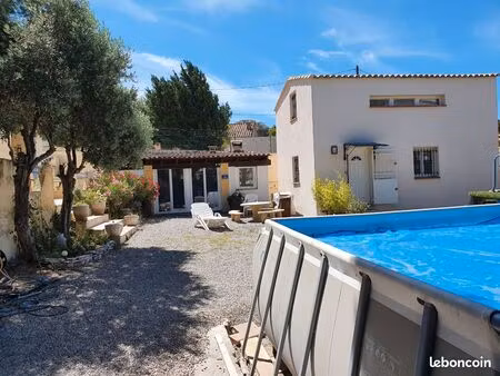 terrain de 1 000m² avec 2 maisons