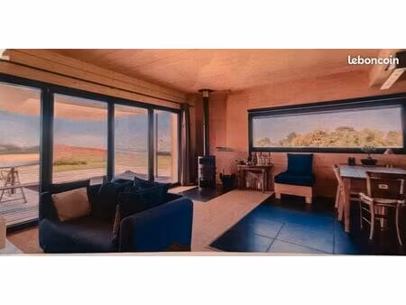 maison bioclimatique avec étang