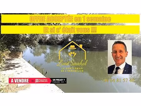 terrain de loisirs de plus de 800 m2 + un abri en dur de plus de 20 m2avec un abri au bord