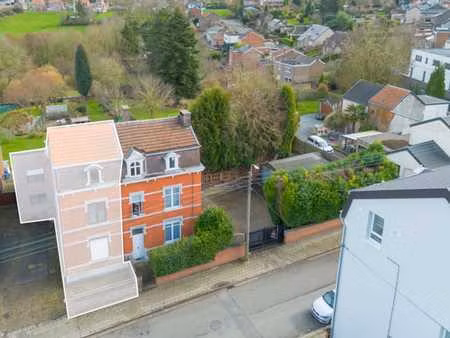 ensemble immobilier ( spacieuse maison + terrain a batir )