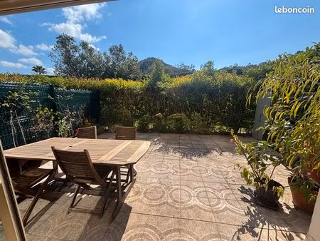 t2 rez de jardin + place de parking