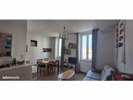 appartement traversant - centre-ville - 3 pièces avec balcon et espace terrasse