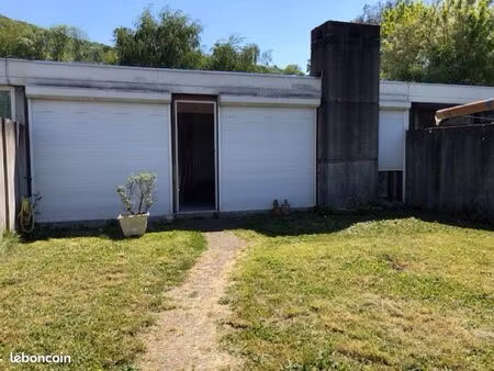 maison mitoyenne toit plat jardin garages patio à rafraîchir