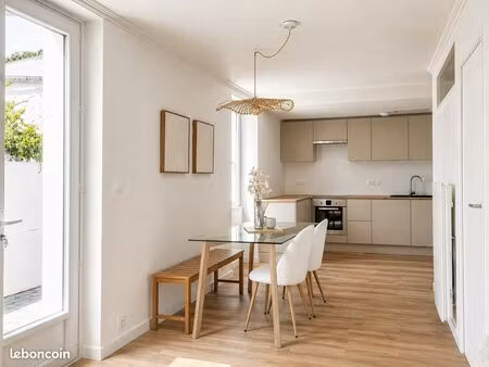 appartement rénové avec place de stationnement – plage et marché à pied