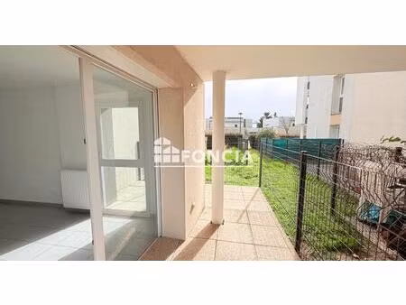 rare à la vente - chassieu centre - t2 en rez-de-jardin