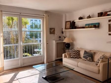 appartement - 65m² lumineux avec balcon vue jardin – 2 pièces – métro pont de neuilly