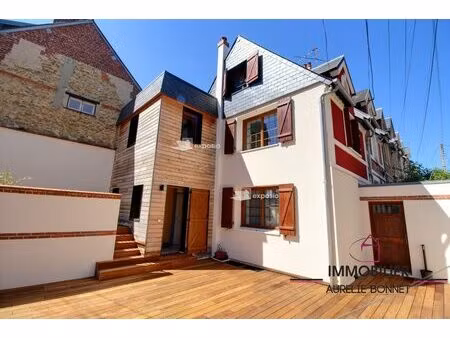 maison avec terrasses et garage