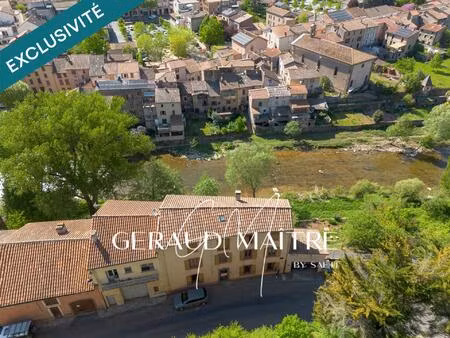 maison de village 5 ch avec jardin et garage  vue sur la rivière.