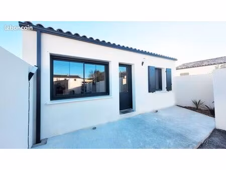 maison neuve 60m² + courette de 50m²