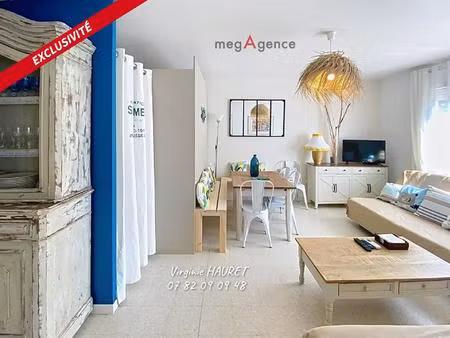 appartement 65m² - 2 chambres - 1 buanderie - 1 place de parking